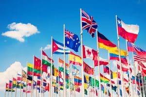 International flags, Upcoming Corporate Tax Rate Reductions and Missing Profits of Nations