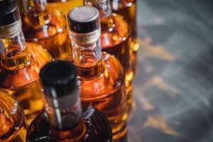 Trump tariffs threaten American Whiskey and Bourbon exports US tariffs and retaliation US tariffs tax on exports and US exporters